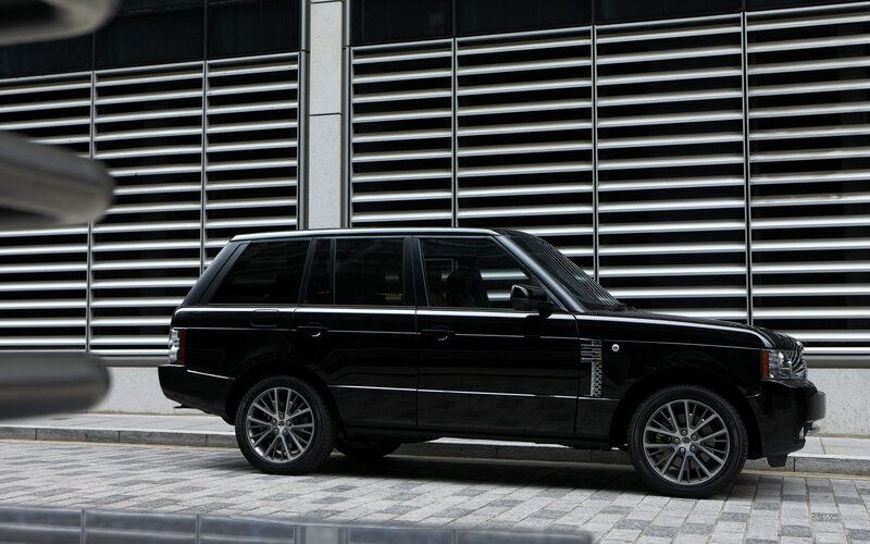 black range rover parked