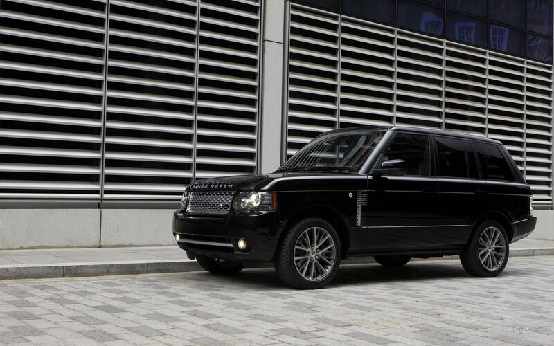 Black Range Rover parked on street