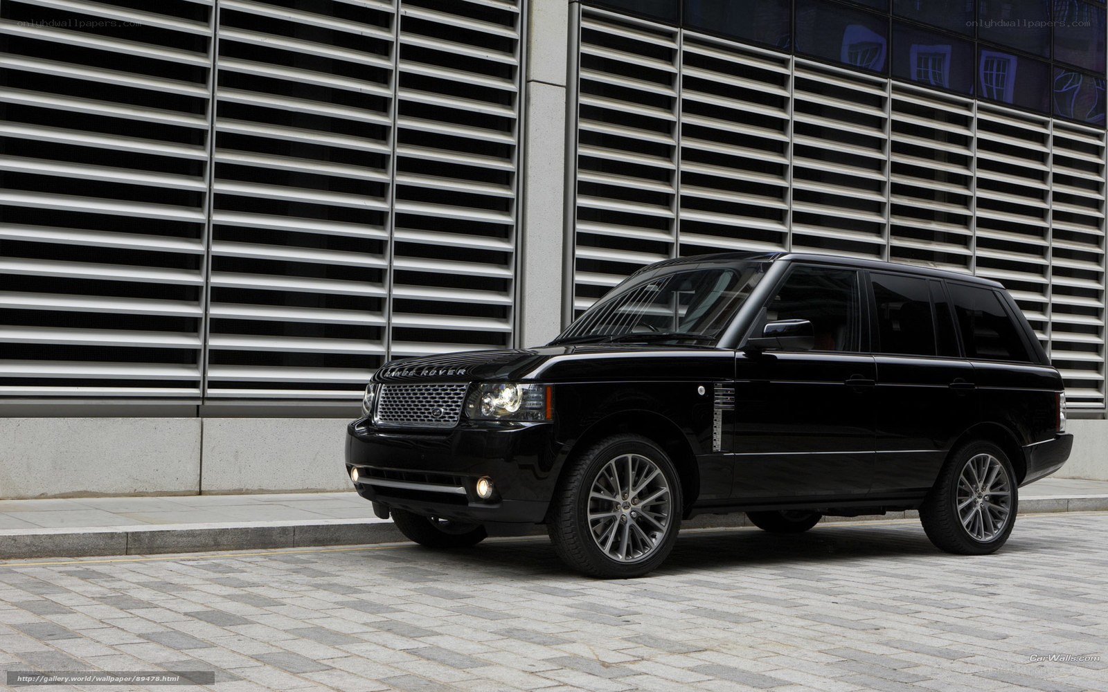 Black Range Rover parked outside