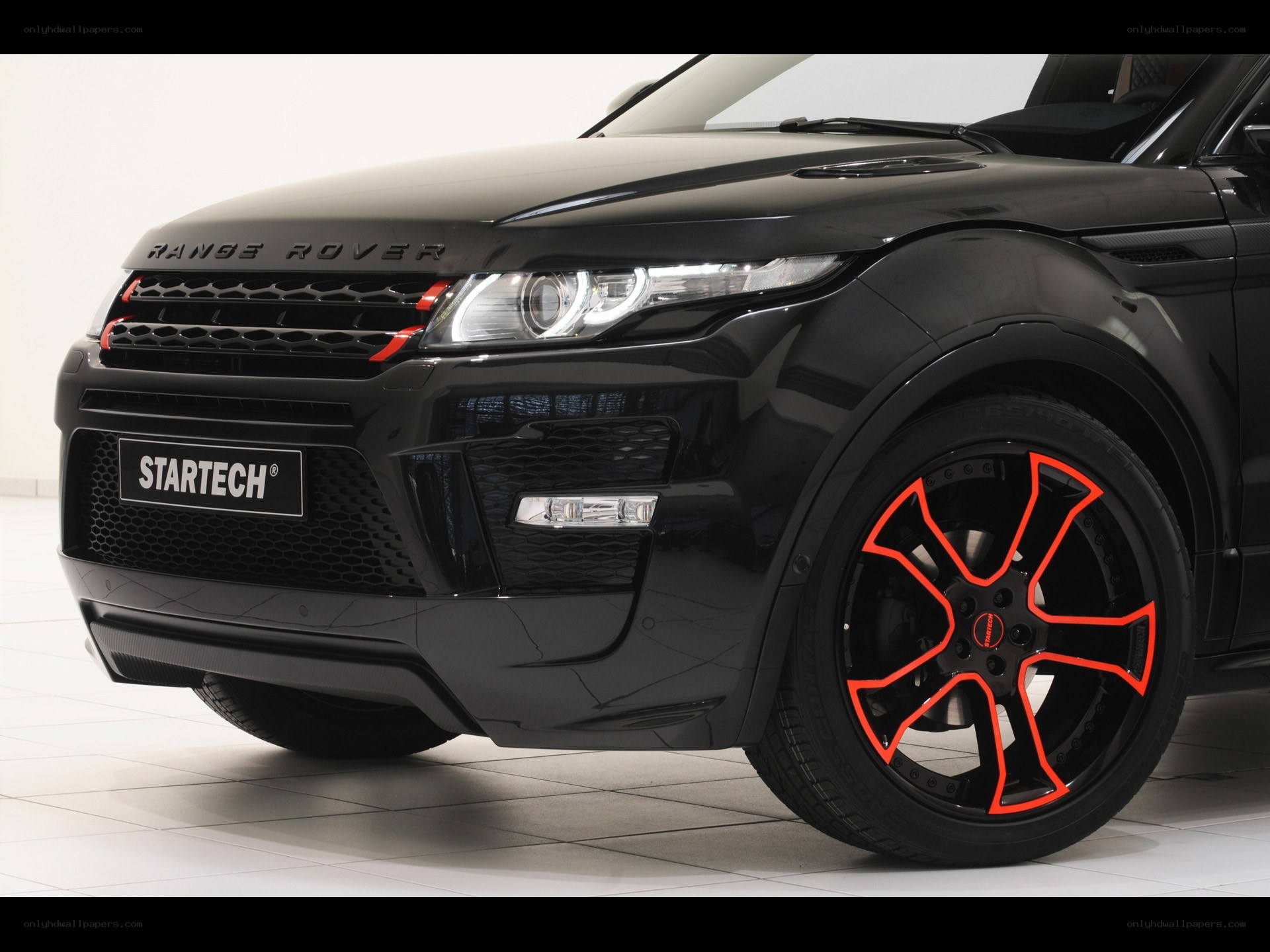 Black Range Rover with red accents