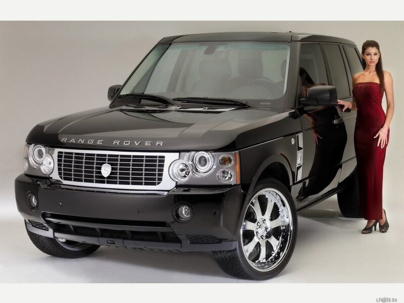 Black Range Rover with woman