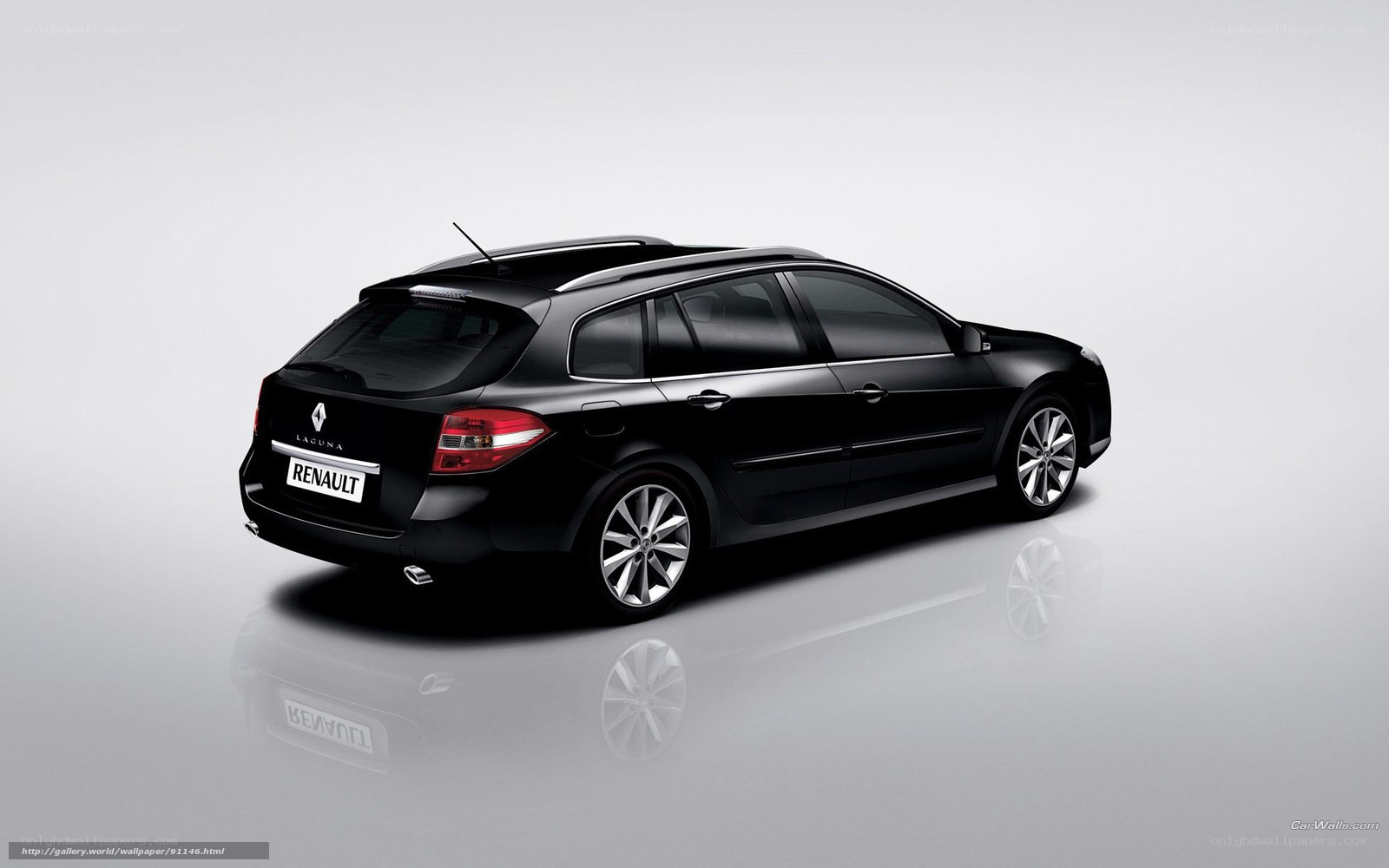 Black Renault Laguna station wagon