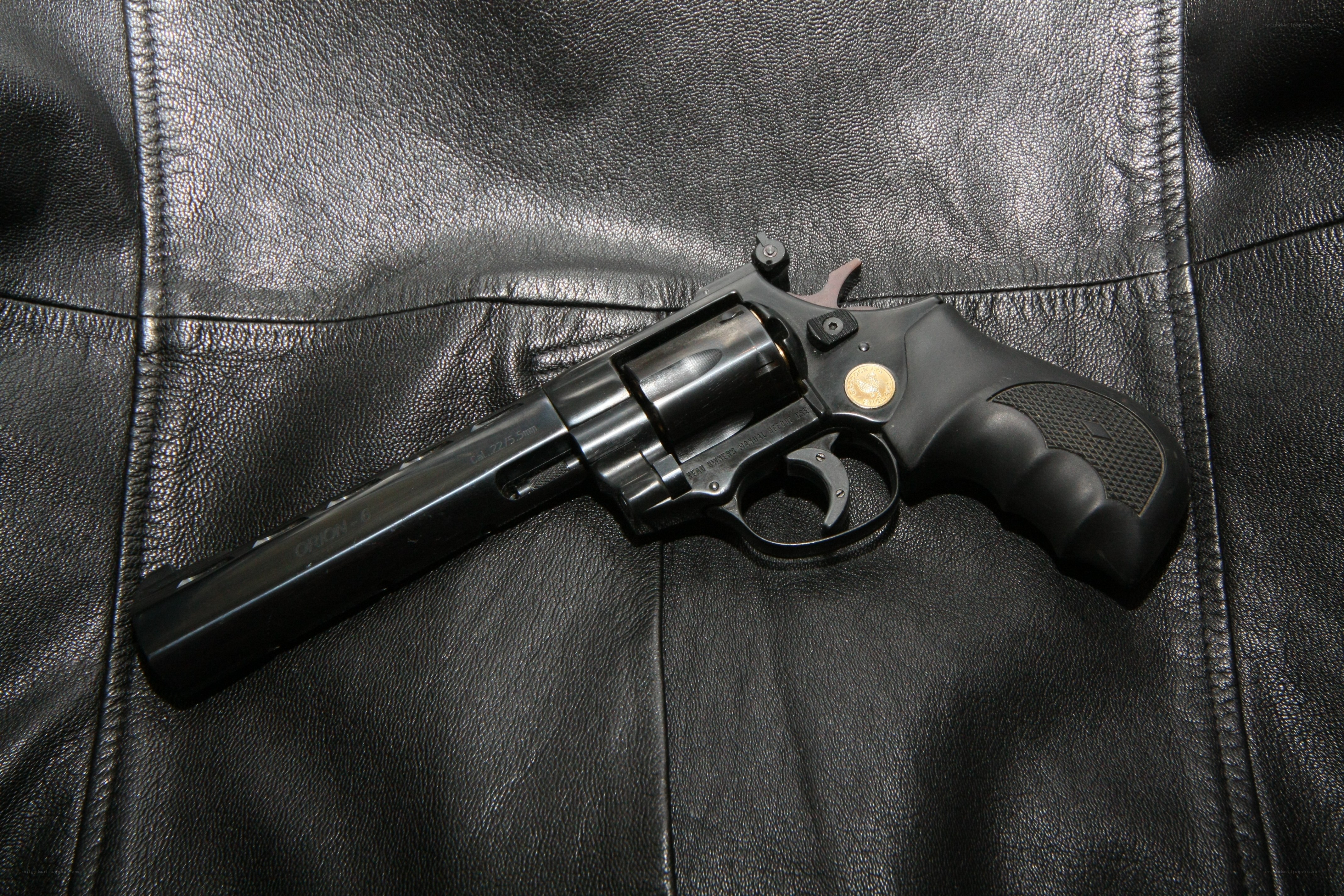 black revolver on leather