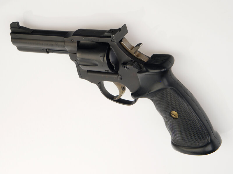 black revolver on white background