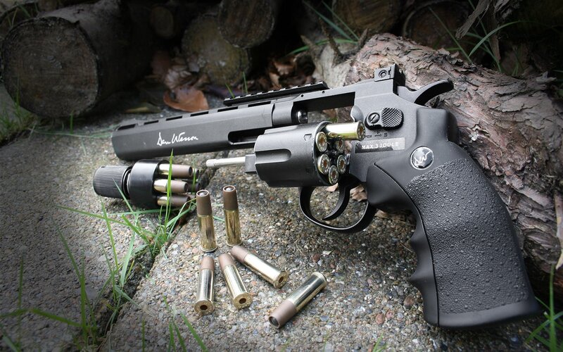 Black Revolver with Bullets — Dramatic