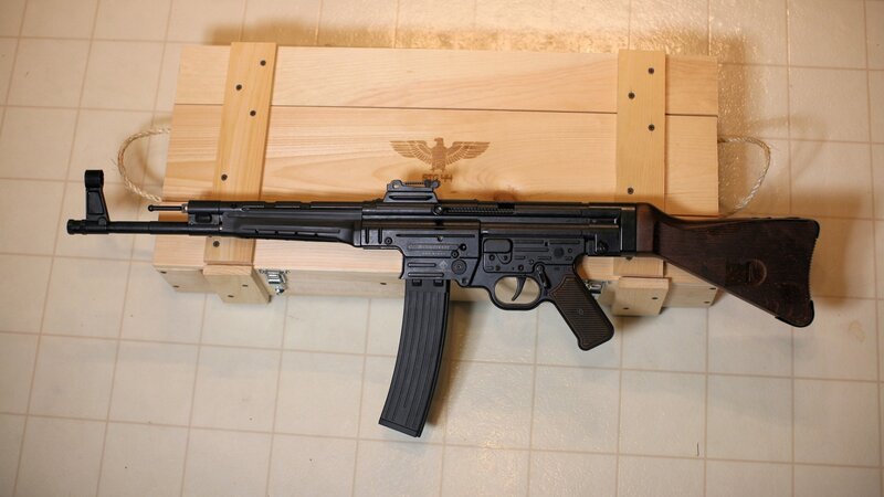 Black Rifle on Wooden Box