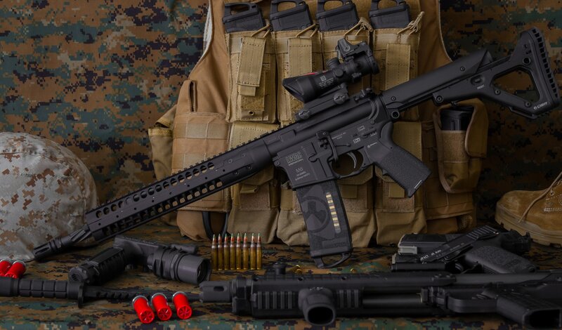 Black Rifle with Accessories — Brown