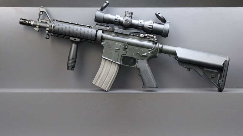 black rifle with scope