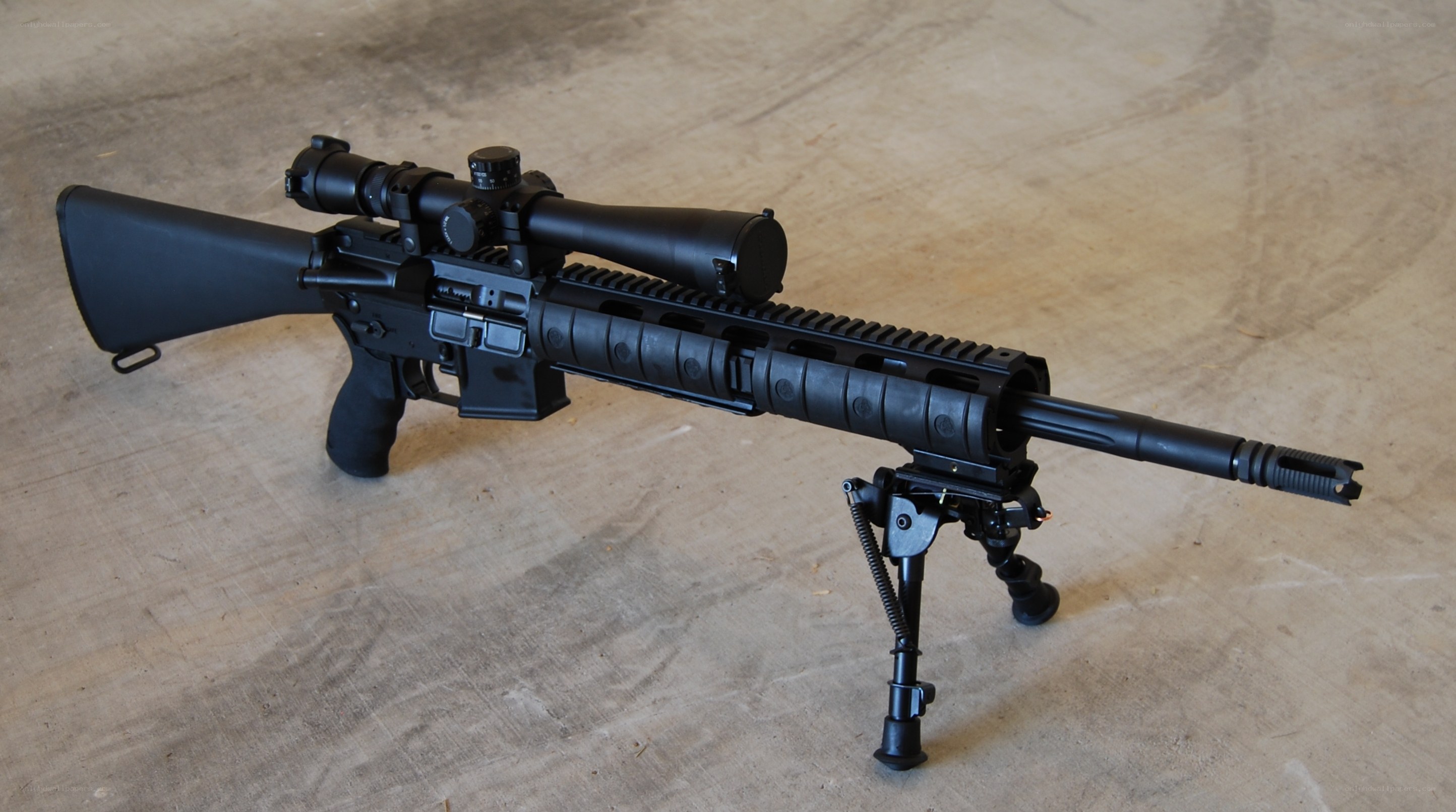 black rifle with scope