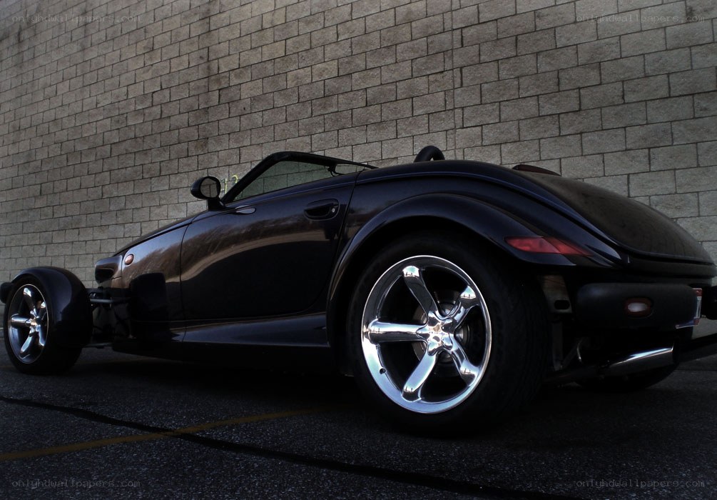 Black roadster car parked
