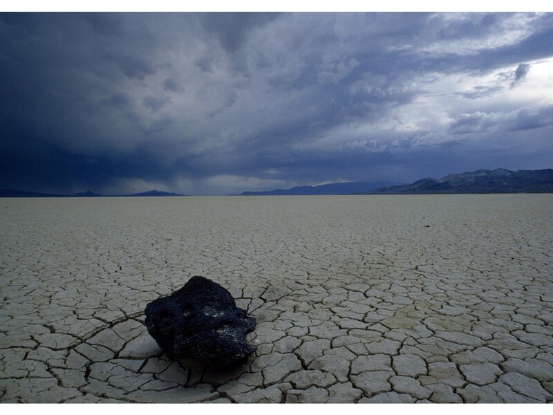 Black Rock on Cracked Earth