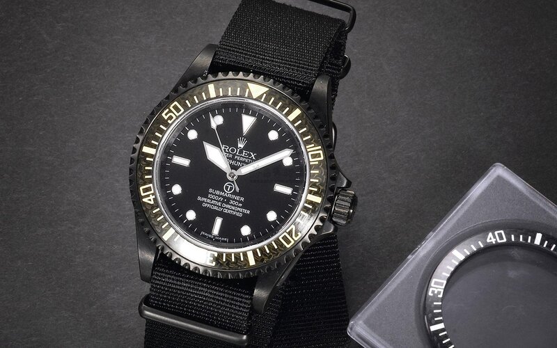 black rolex submariner watch