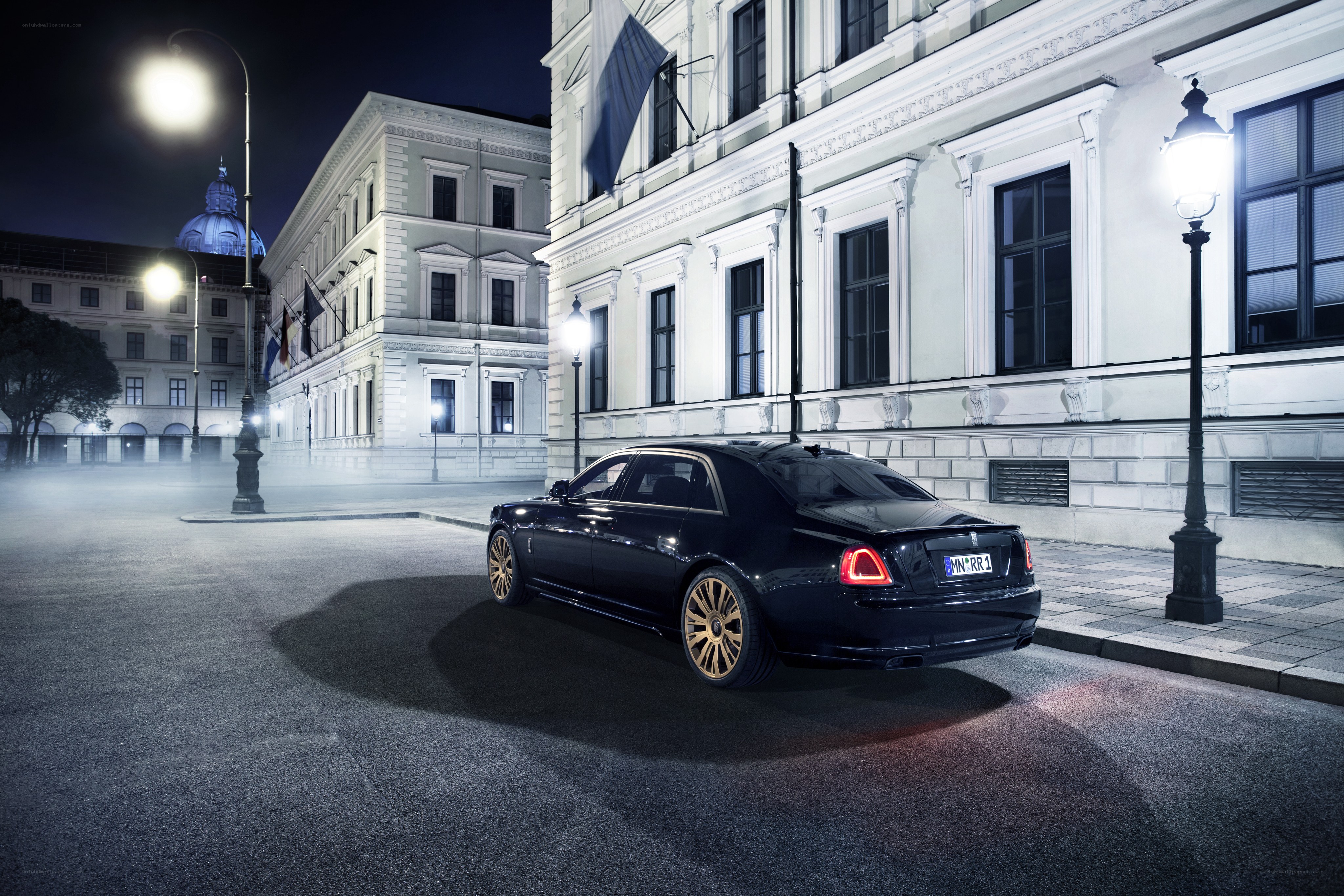 Black Rolls-Royce at night