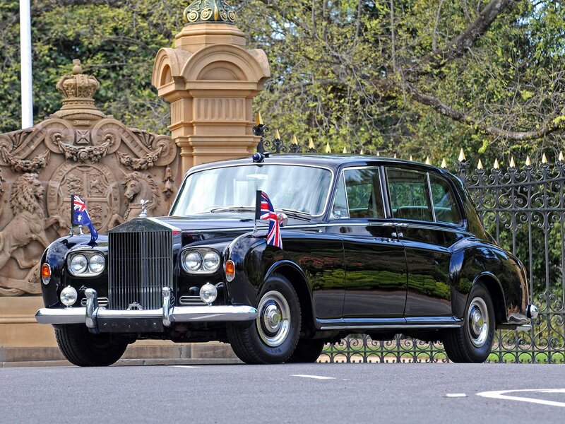 Black Rolls-Royce at official entrance