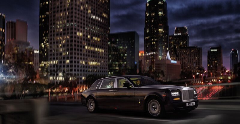Black Rolls-royce Car — Dramatic, Night, Photograph, City Skyline