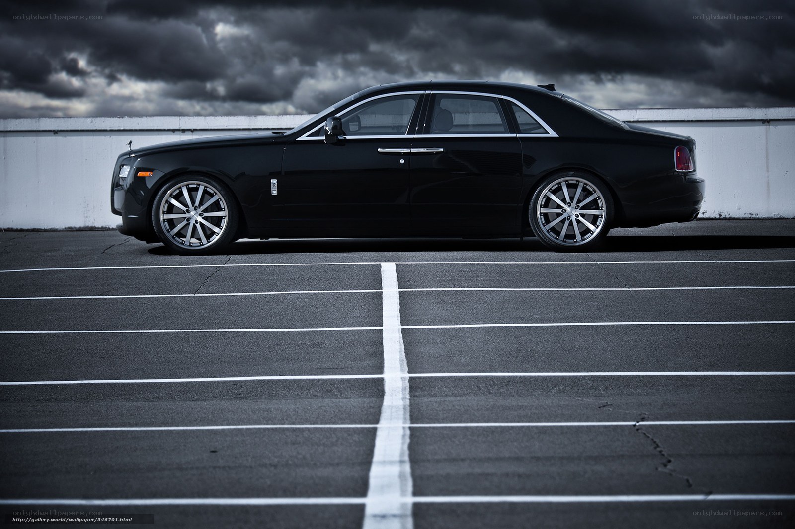 Black Rolls-Royce in parking lot