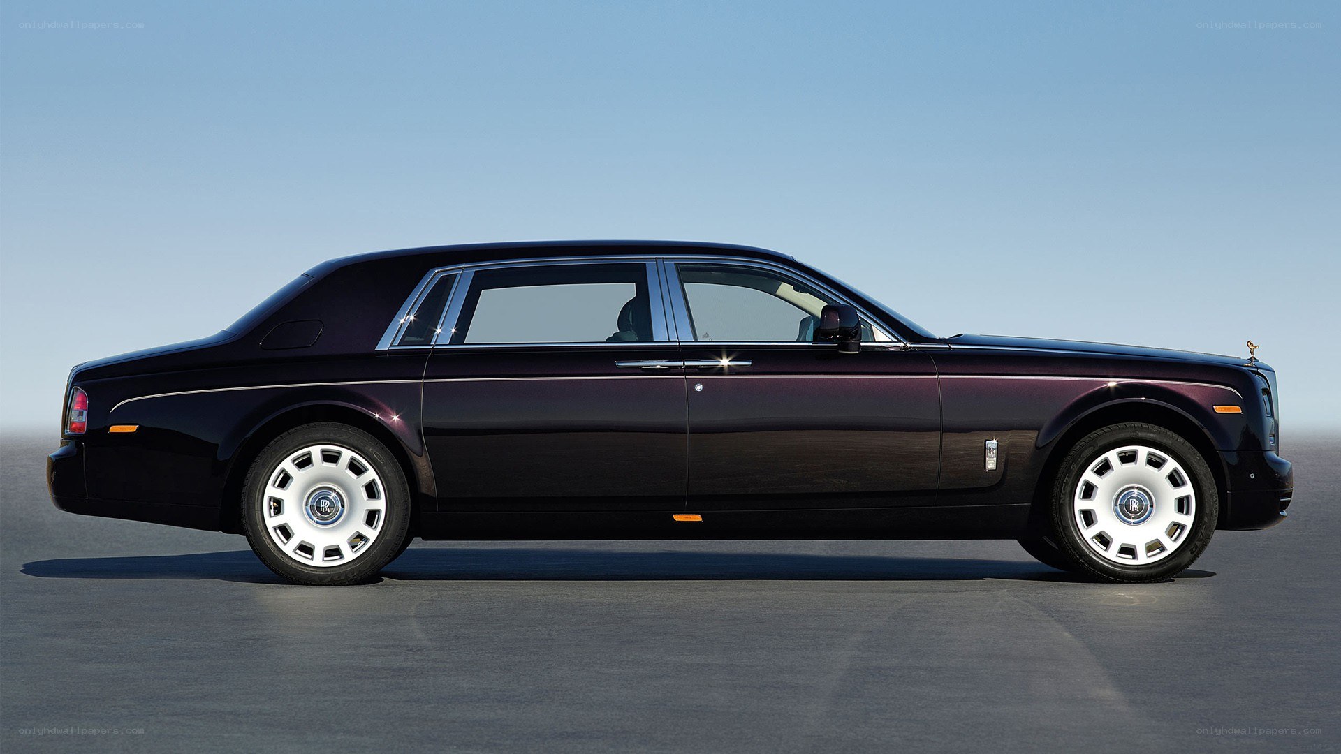 black rolls-royce luxury sedan