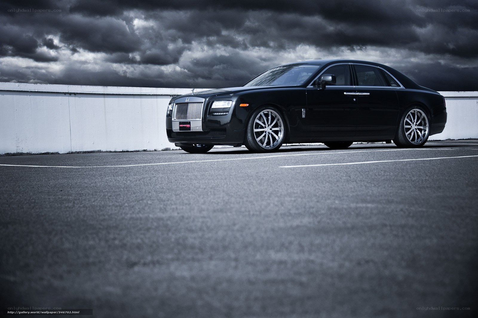 Black Rolls-Royce on a cloudy day
