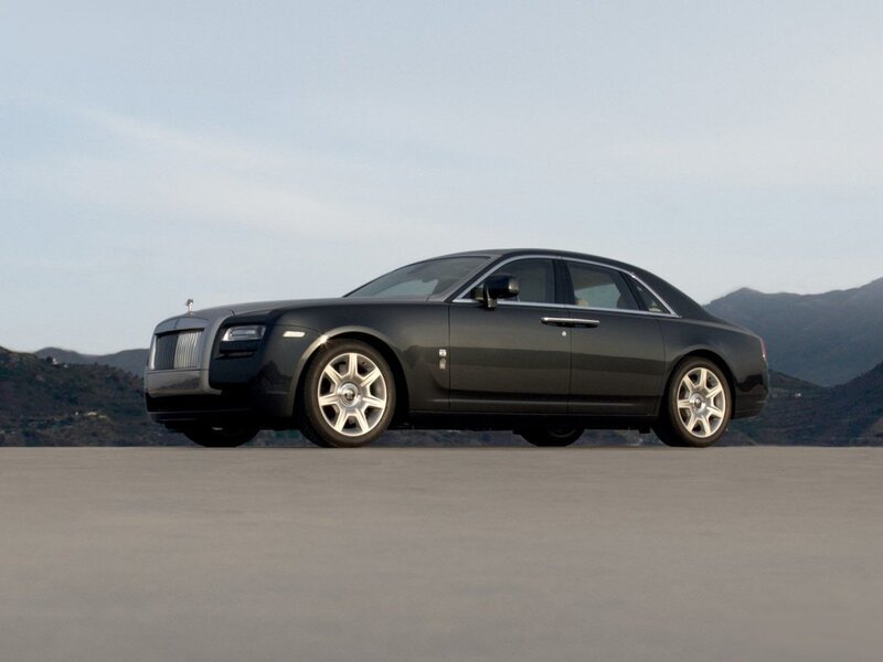 Black Rolls-Royce on a paved surface