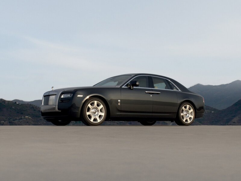 Black Rolls-Royce on a paved surface