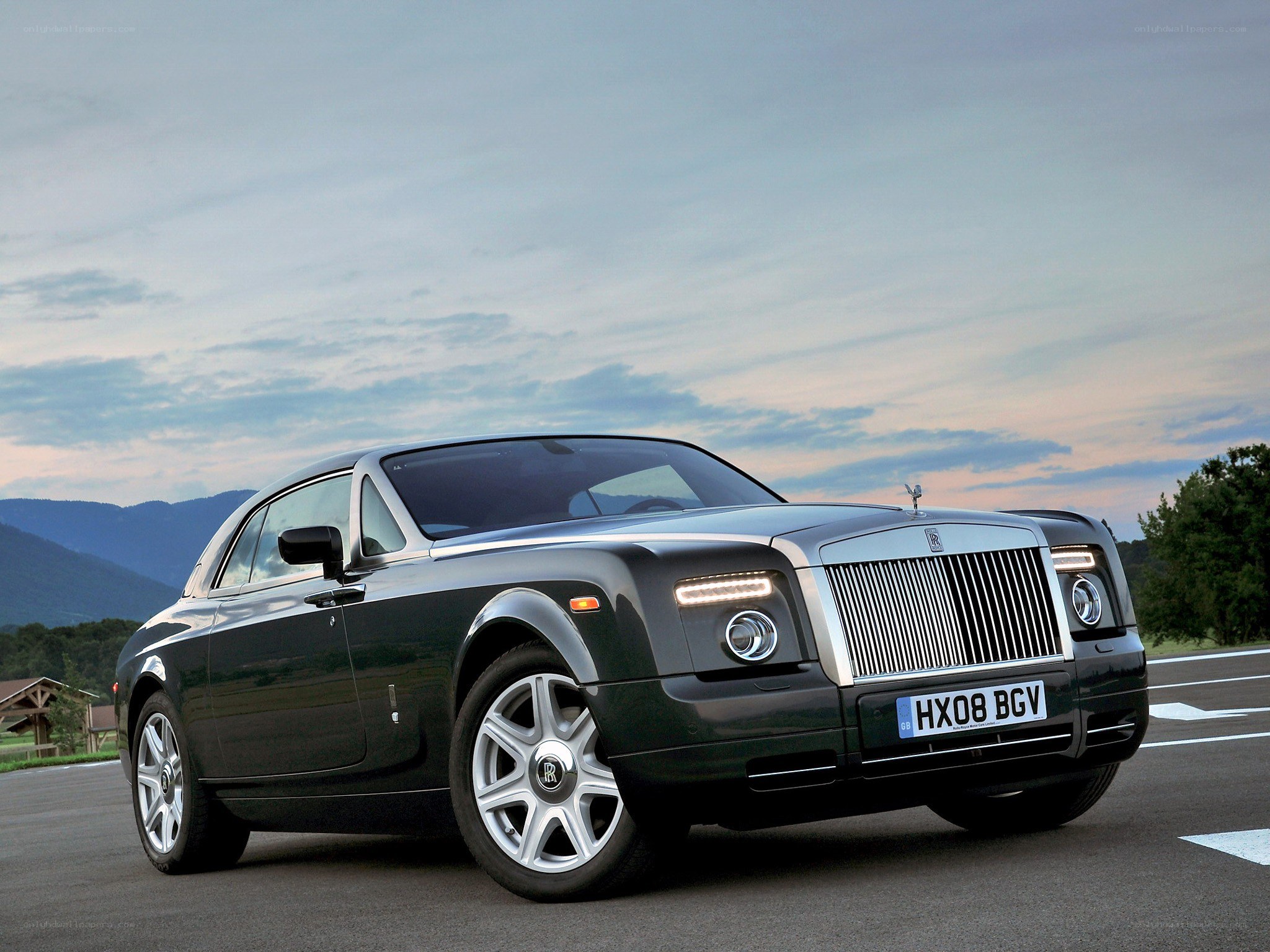 Black Rolls-Royce on a road
