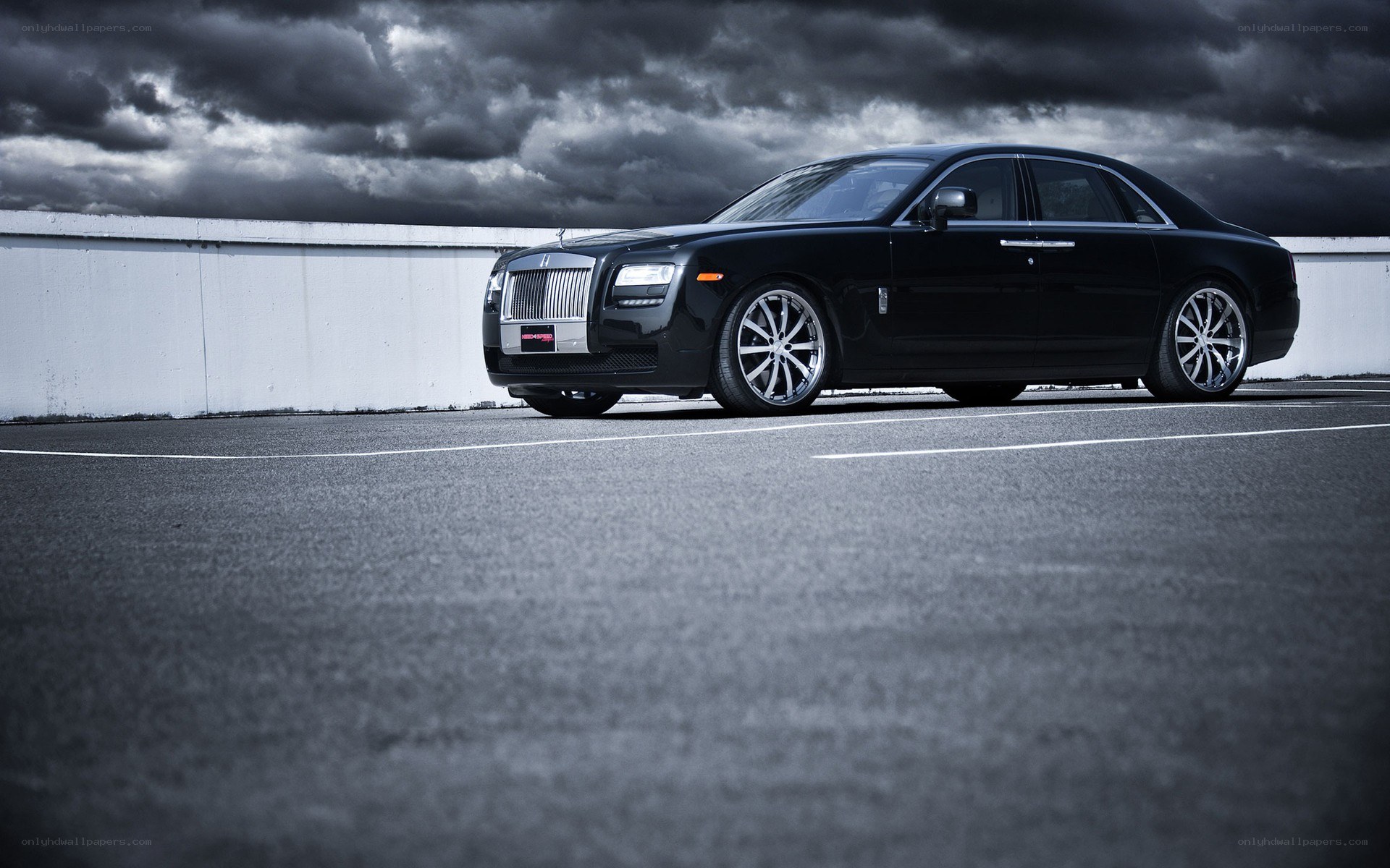Black Rolls-Royce on a rooftop