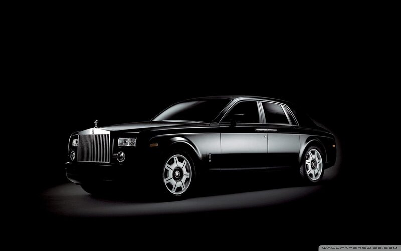 Black Rolls-Royce on dark background