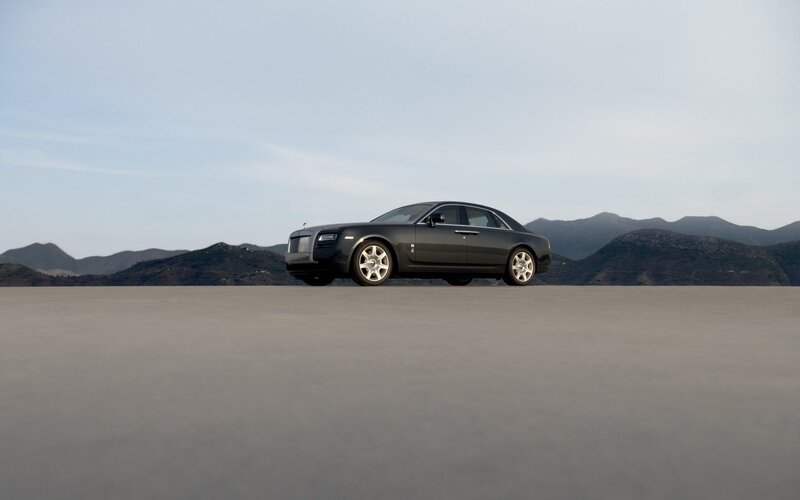 Black Rolls-Royce on desert plain