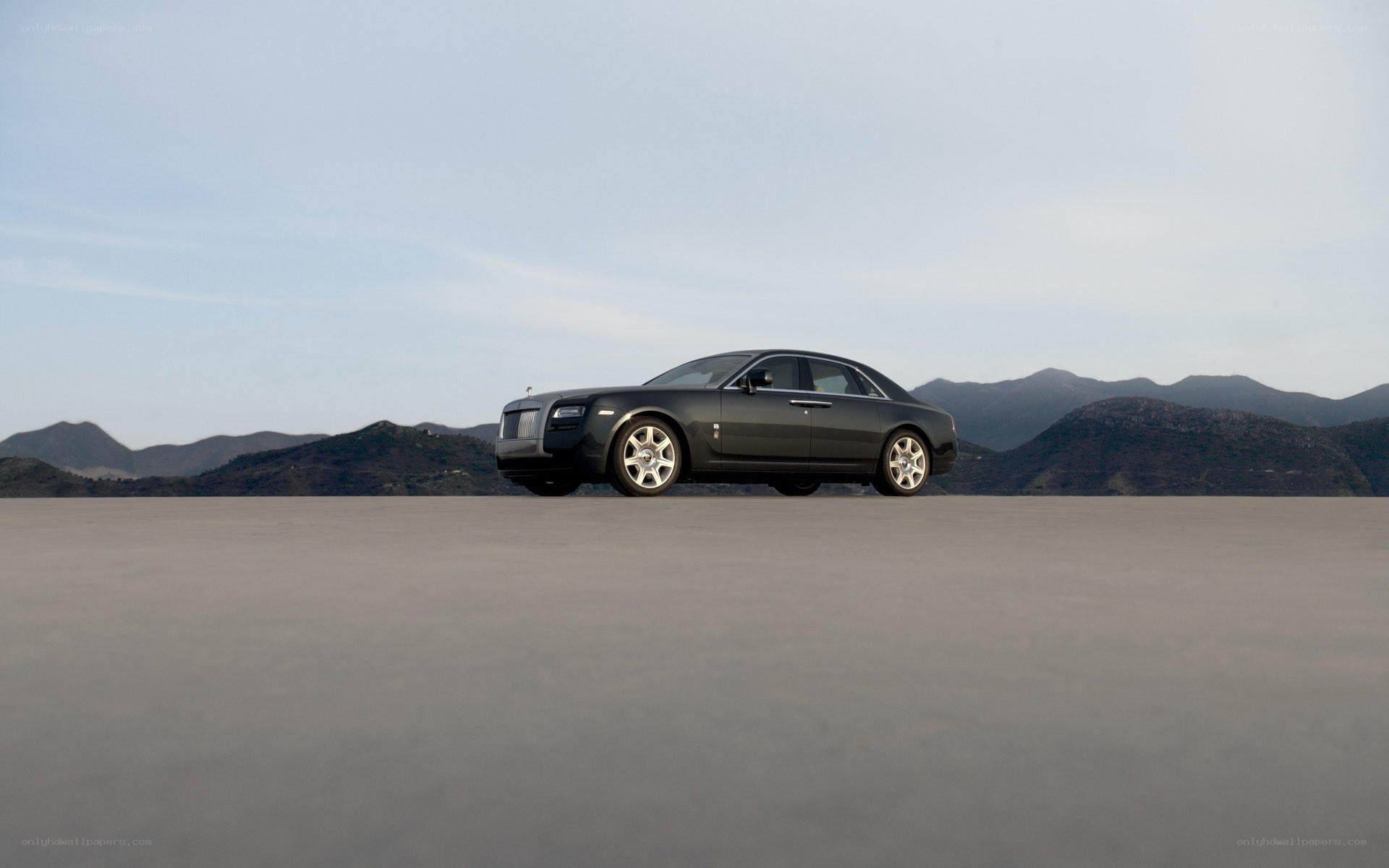 Black Rolls-Royce on desert plain