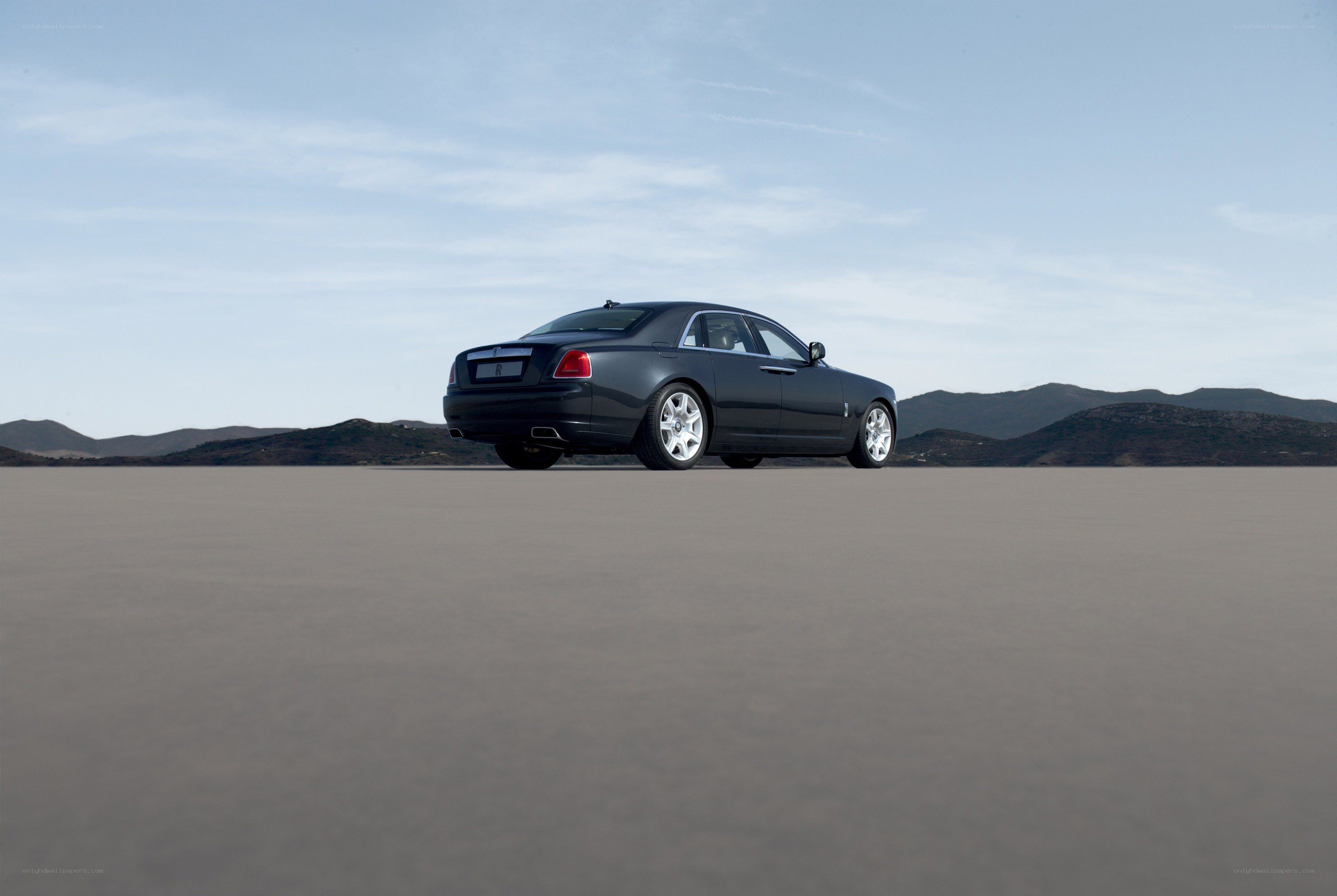 Black Rolls-Royce on desert plain