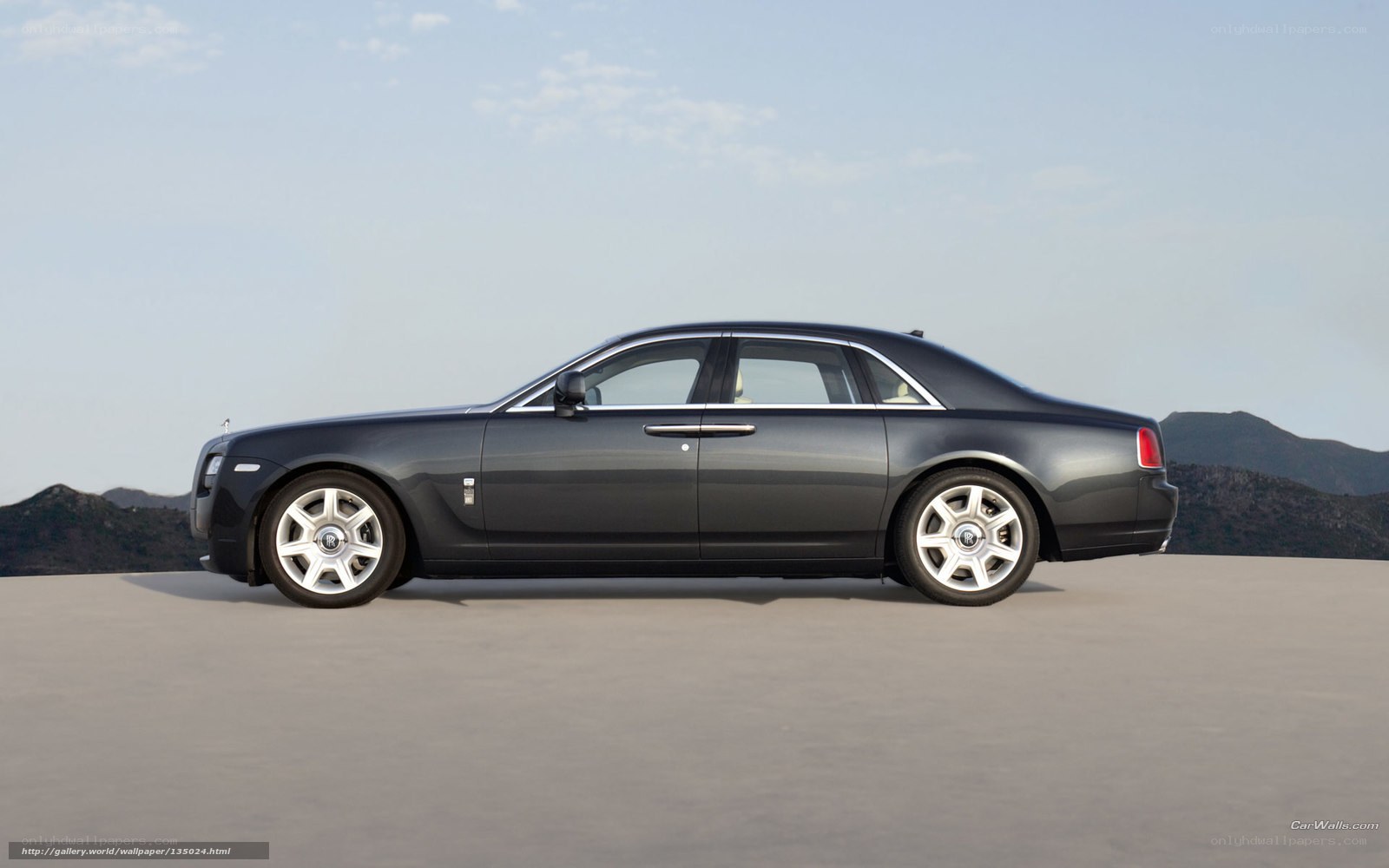 Black Rolls-Royce on desert plain