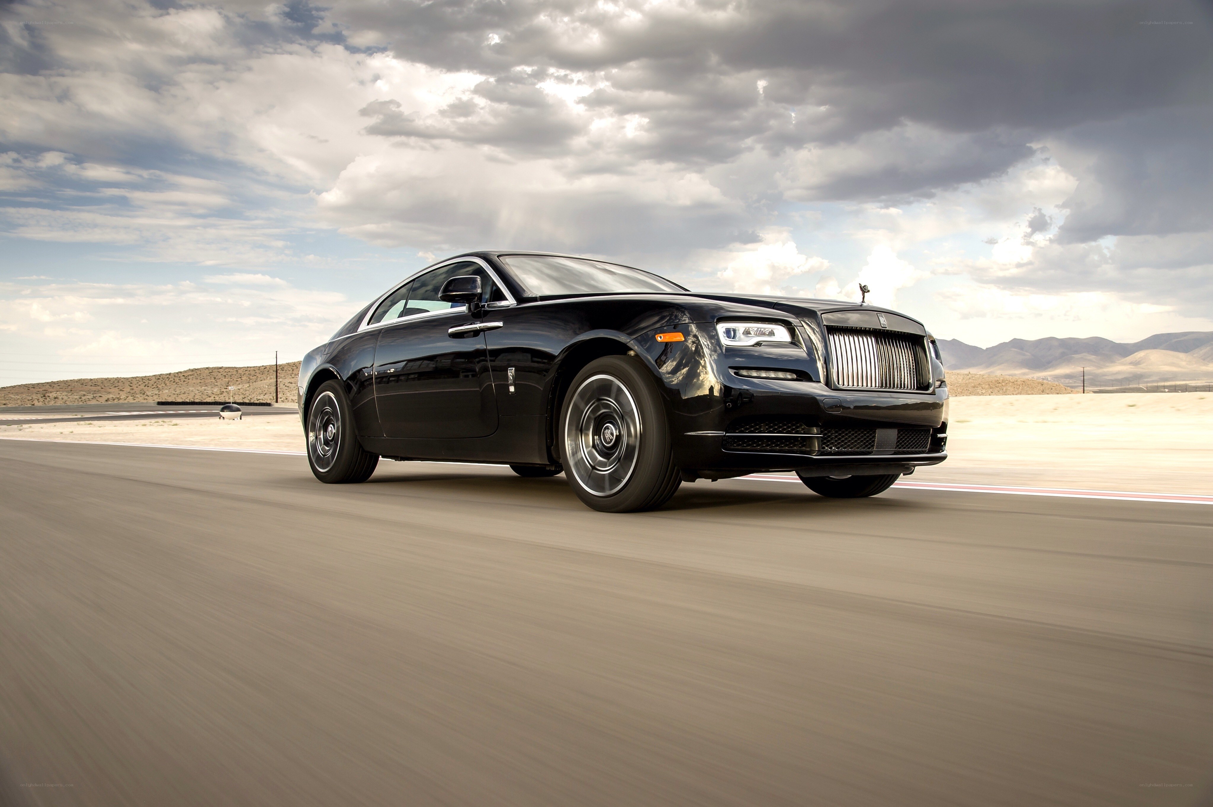 Black Rolls-Royce on desert track