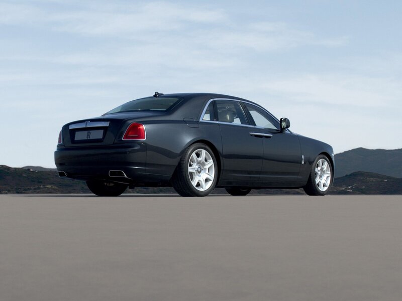 Black Rolls-Royce on open road