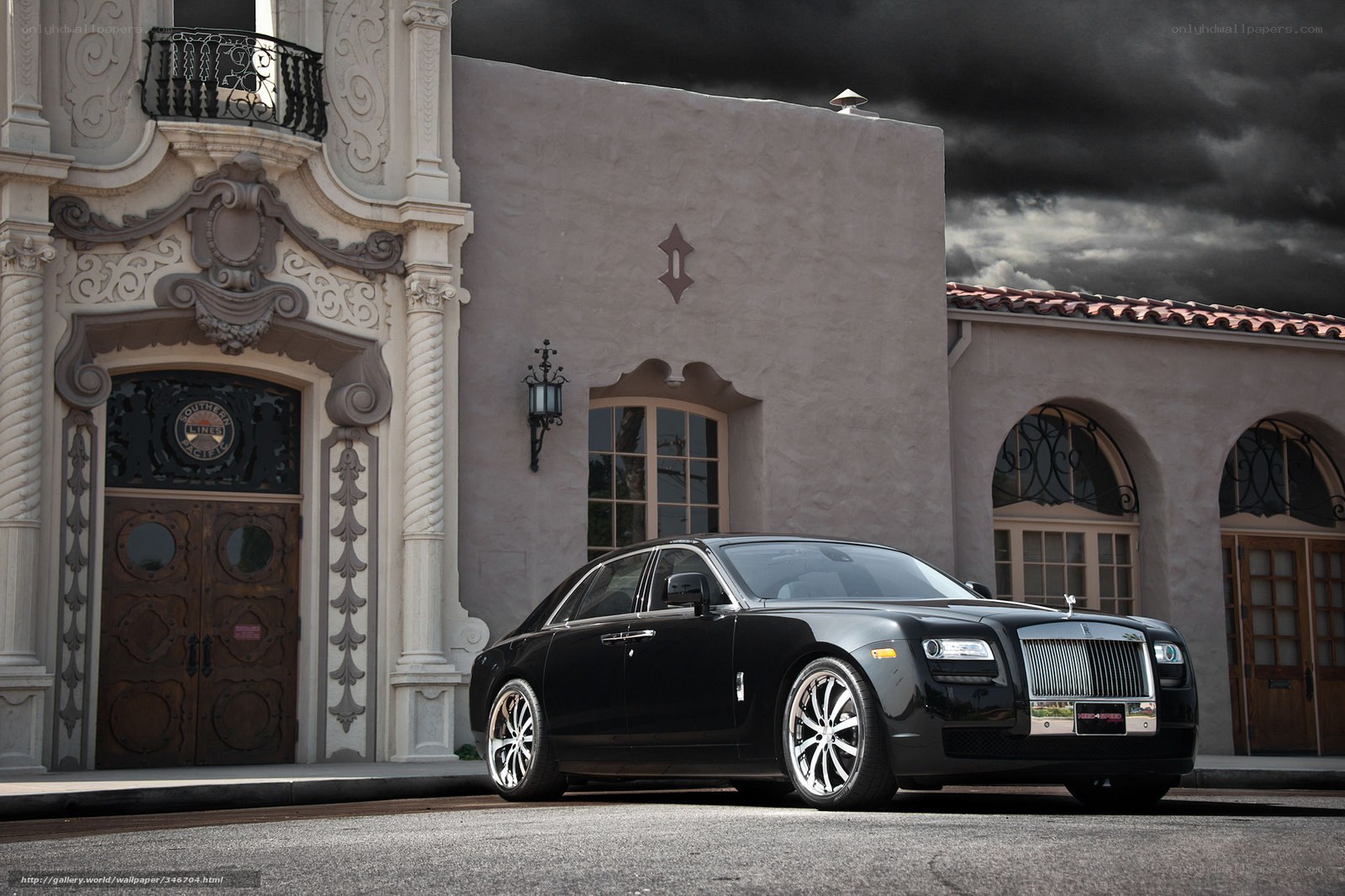 Black Rolls-Royce outside ornate building