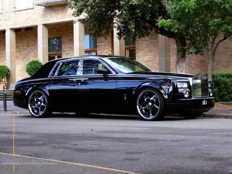 black rolls-royce parked outside