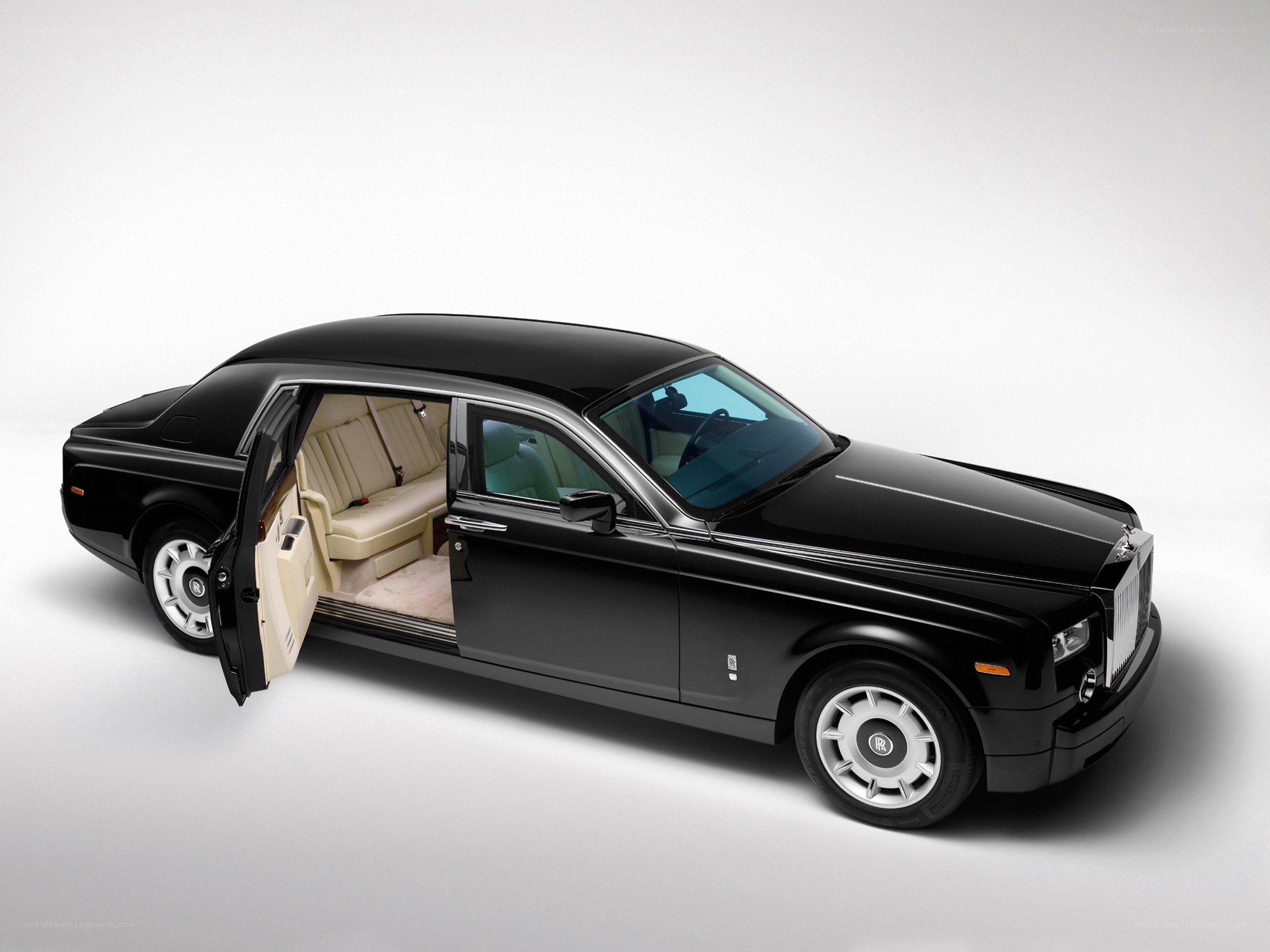 Black Rolls-Royce with open door