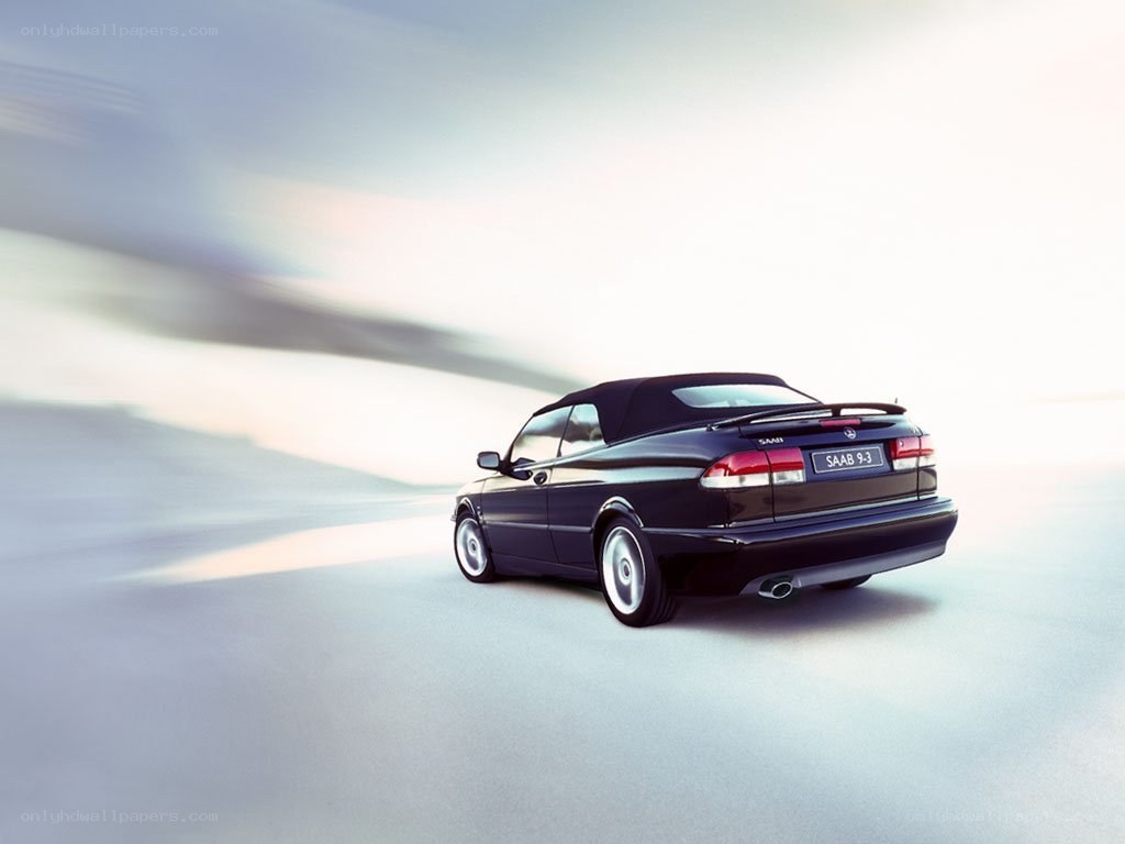 Black Saab 9-3 convertible in motion