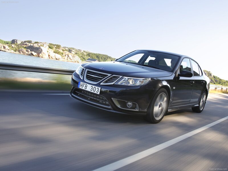 Black Saab 9-3 in motion