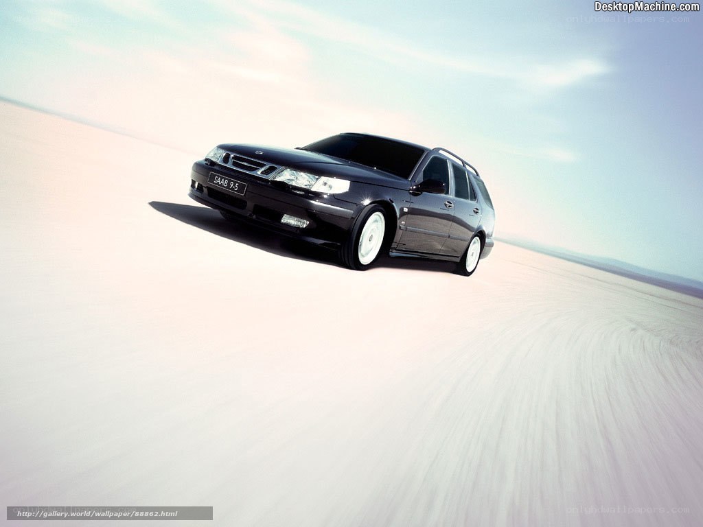 Black Saab 9-5 in desert