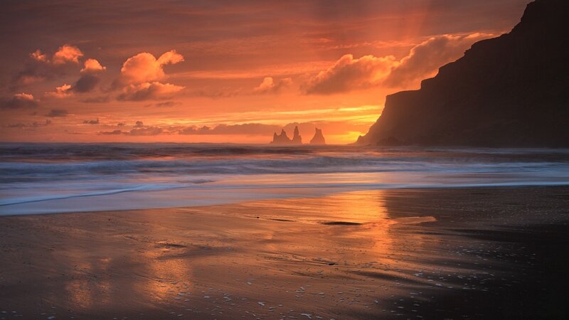 Black Sand Beach at Sunset — Orange, Dramatic, Photograph