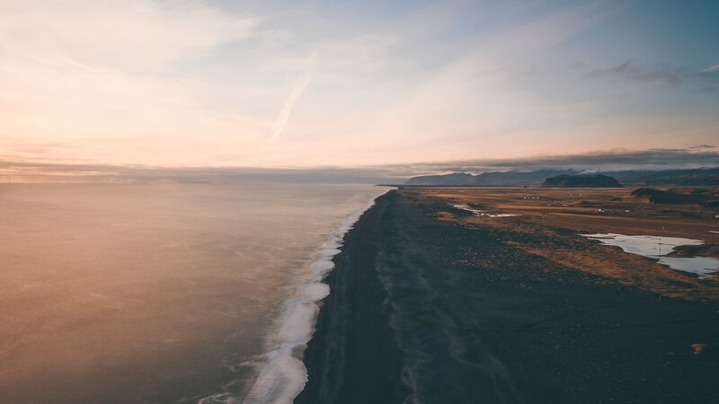 Black Sand Beach at Sunset — Orange, Serene, Photograph