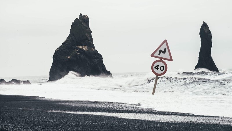Black Sand Beach — Dramatic, Photograph, Rock Formations
