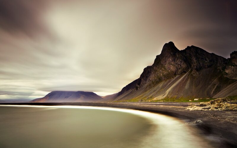 Black Sand Beach with Mountains — Gray