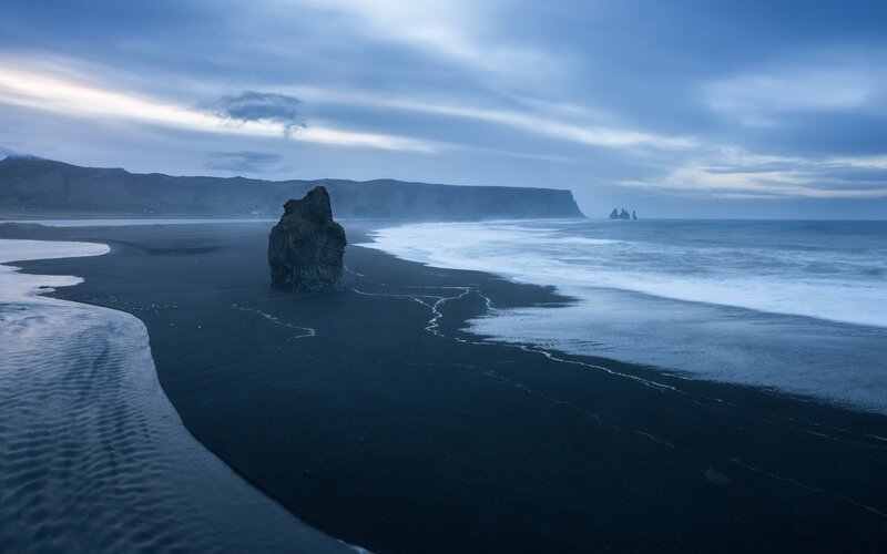 Black Sand Beach with Sea Stacks — Blue