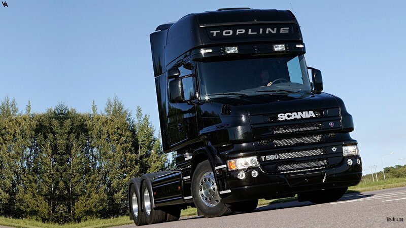 Black Scania T580 truck on road