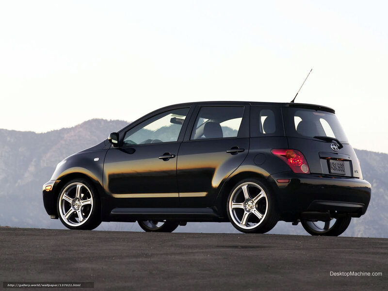 Black Scion xA on a mountain road
