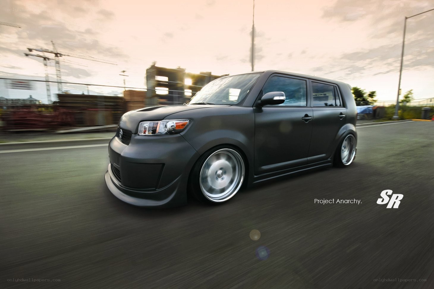 black scion xB in motion