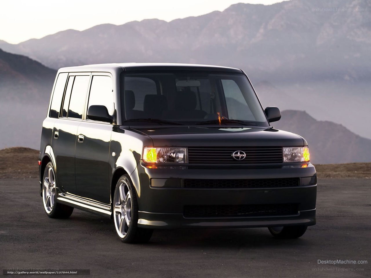 black scion xb in mountain landscape