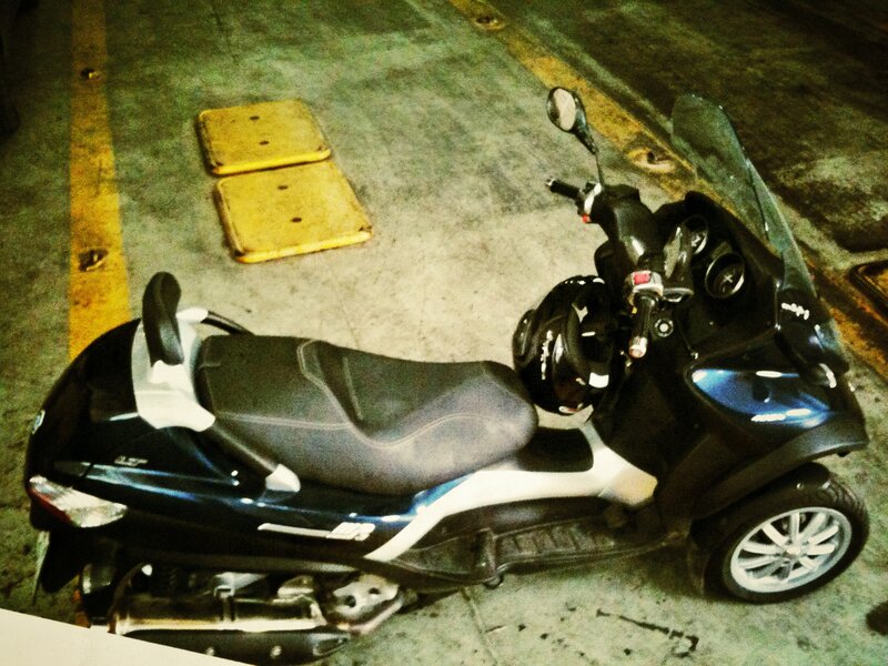 Black Scooter in Garage