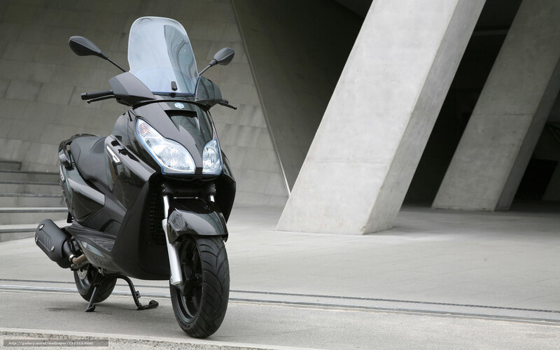Black scooter in modern architecture